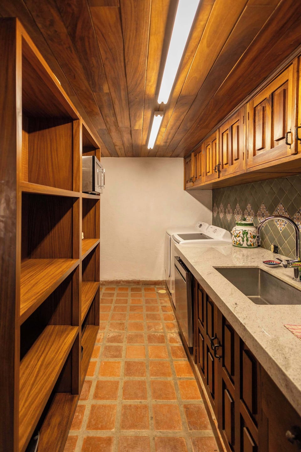 Spacious and well-organized kitchen area with ample storage, designed for a seamless and comfortable stay.