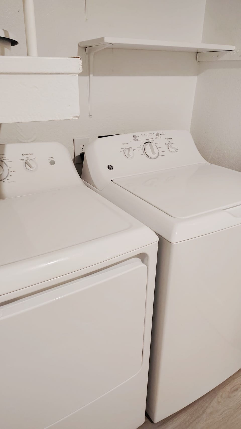 Convenient in-unit washer and dryer with handy storage shelf