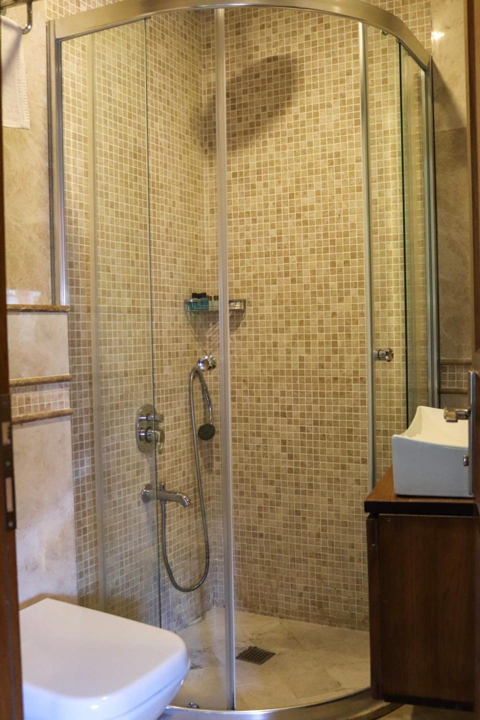 Shower, free toiletries, hair dryer, slippers