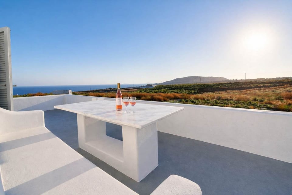 Spacious outdoor terrace with minimalist design and panoramic views. Enjoy al fresco dining, lounging under the sun, or gathering with friends in this peaceful open-air space