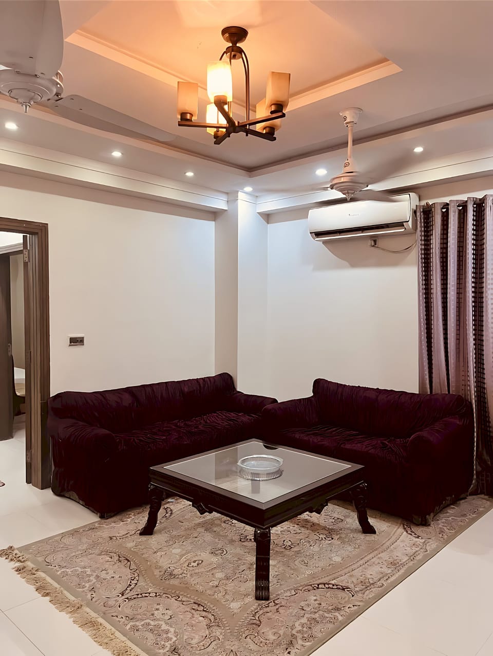 Executive Room | Living area | 32-inch flat-screen TV with cable channels