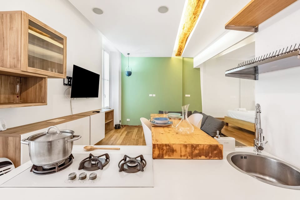 Standard Apartment, Multiple Bedrooms (Lavagna Central Loft) | Private kitchen | Fridge, oven, stovetop, coffee/tea maker