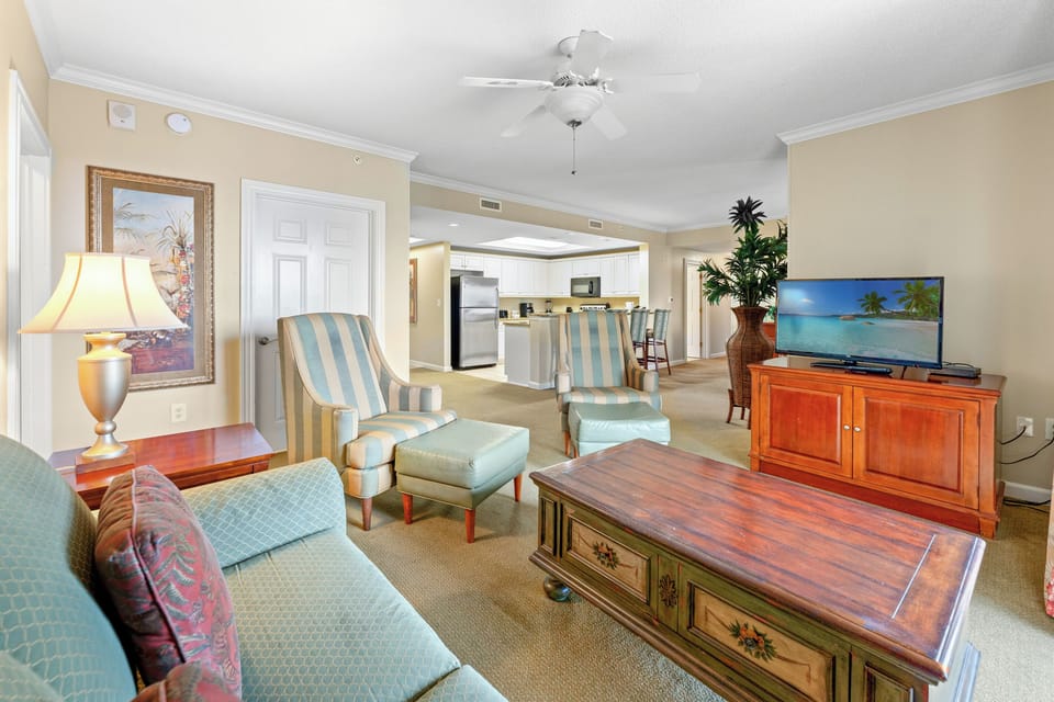 Open Livingroom with sleeper sofa and balcony access