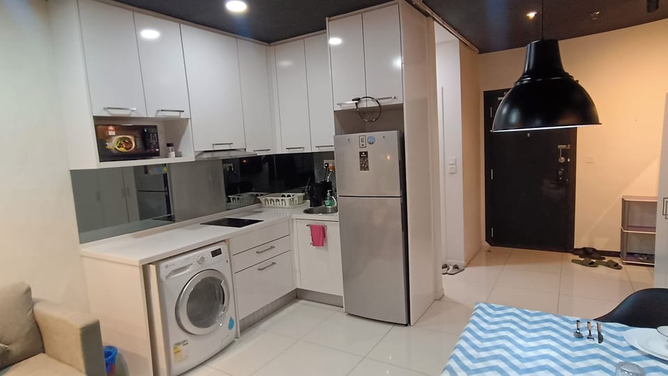 Deluxe Apartment, Balcony, City View | Private kitchen | Full-size fridge, microwave, oven, dishwasher