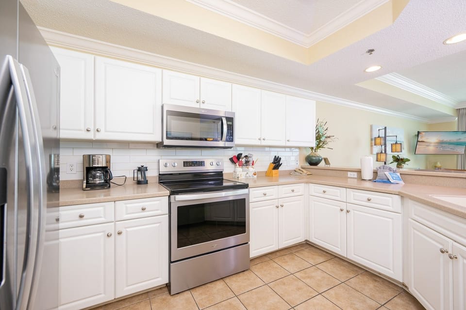 Condo, 2 Bedrooms | Private kitchen | Coffee/tea maker, fridge, oven