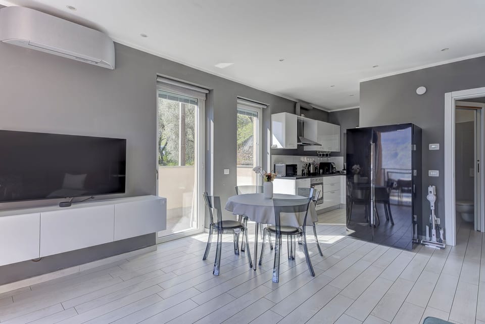 Apartment, 2 Bedrooms, Balcony, Lake View | Living area | 30-inch TV with satellite channels