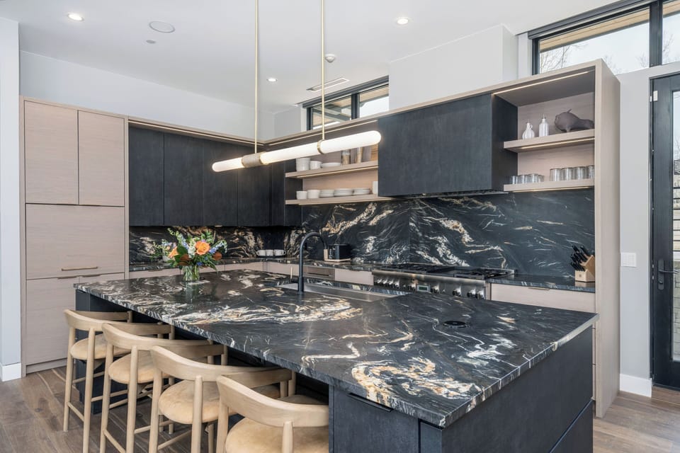The chef-caliber kitchen with modern high-end appliances that elevate both everyday living and entertaining.
