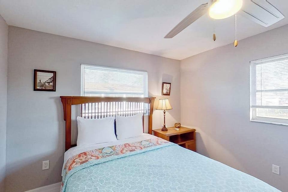 Comfortable guest bedroom offering a cozy and inviting space to relax and recharge after a day of adventure.