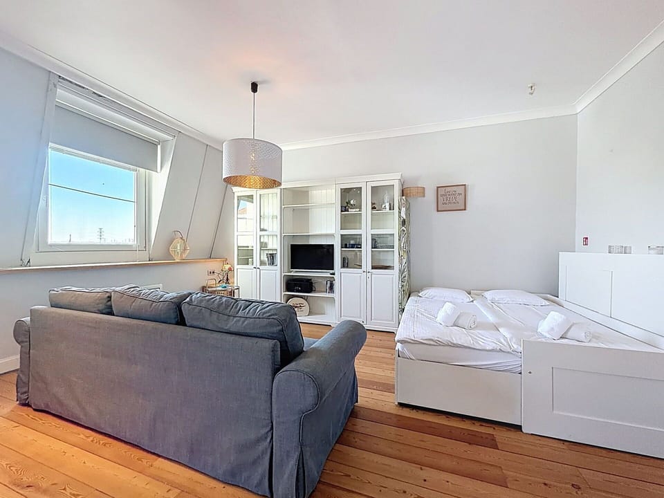 Furniture, Interior Design, Floor, Flooring, Wood, Ceiling, Room, Wood Flooring, Couch, Lighting