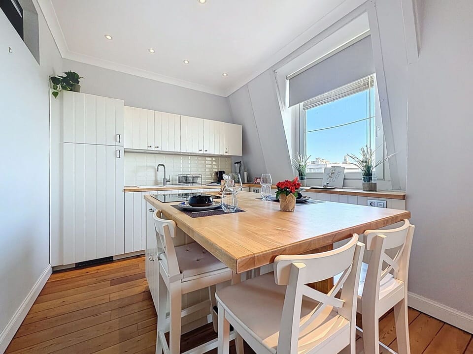 Furniture, Interior Design, Kitchen, Flooring, Chair, Floor, Kitchen Appliance, Wood, Countertop, Ceiling