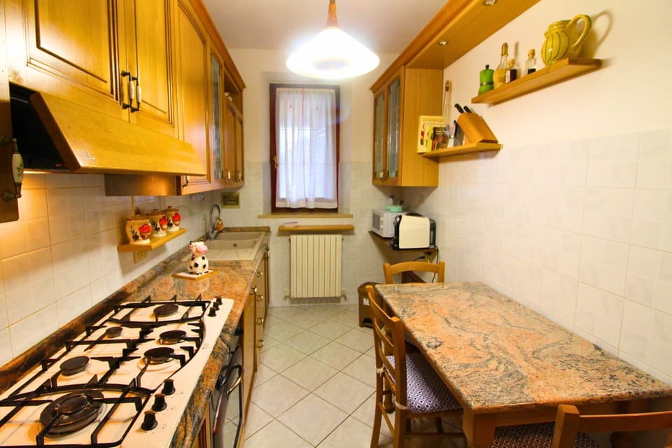 Kitchen, Countertop, Wood, Kitchen Appliance, Major Appliance, Flooring, Interior Design, Ceiling, Room, Floor