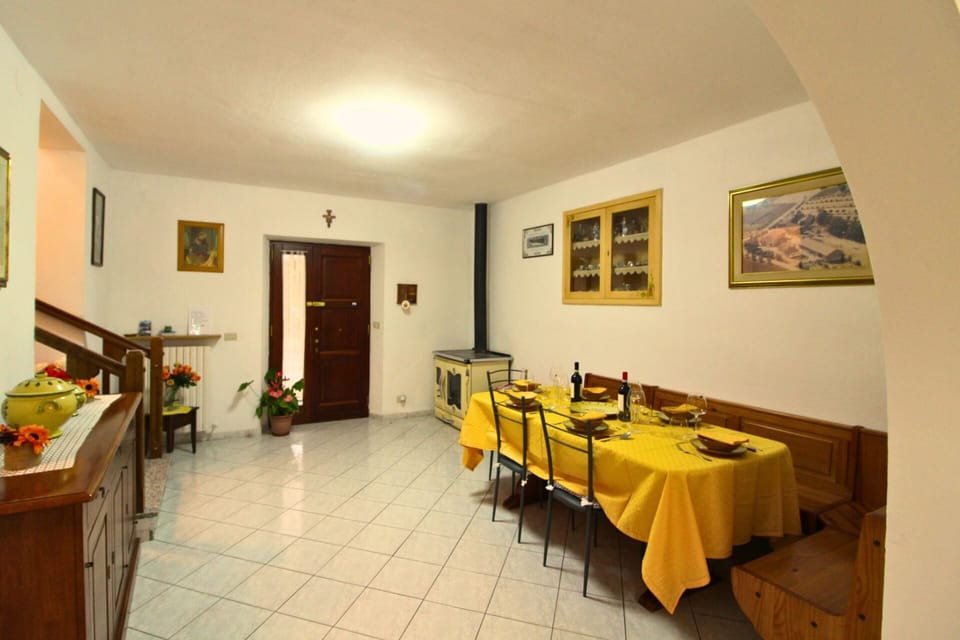 Furniture, Interior Design, Flooring, Wood, Floor, Ceiling, Room, Picture Frame, Lighting, Table