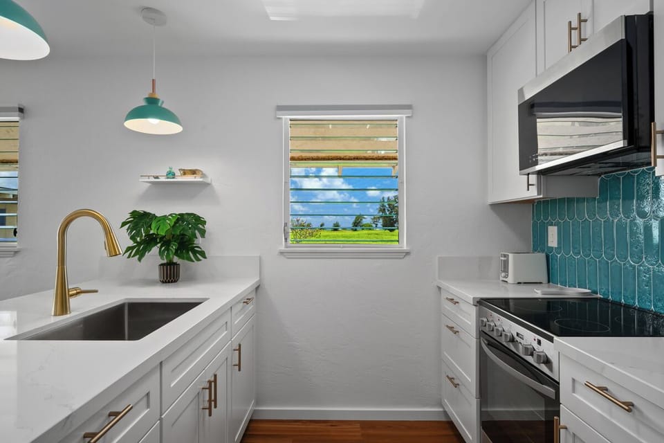 Whip up a quick bite in this nicely updated kitchen.