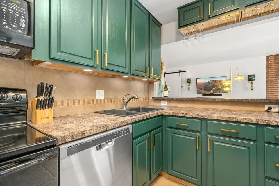 Picture yourself cooking together in this stylish kitchen.