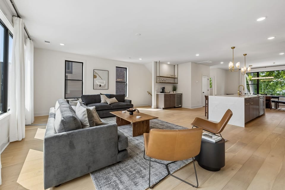 Living Room: Stylish living space featuring a comfy sofa, modern décor, and a flat-screen TV. Ideal for unwinding, socializing, or simply enjoying a peaceful moment indoors.