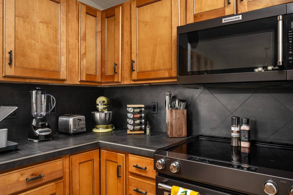 The kitchen is well equipped for a delicious culinary experience. Perfect for cooking dinner, baking cookies, and feeding the whole family!