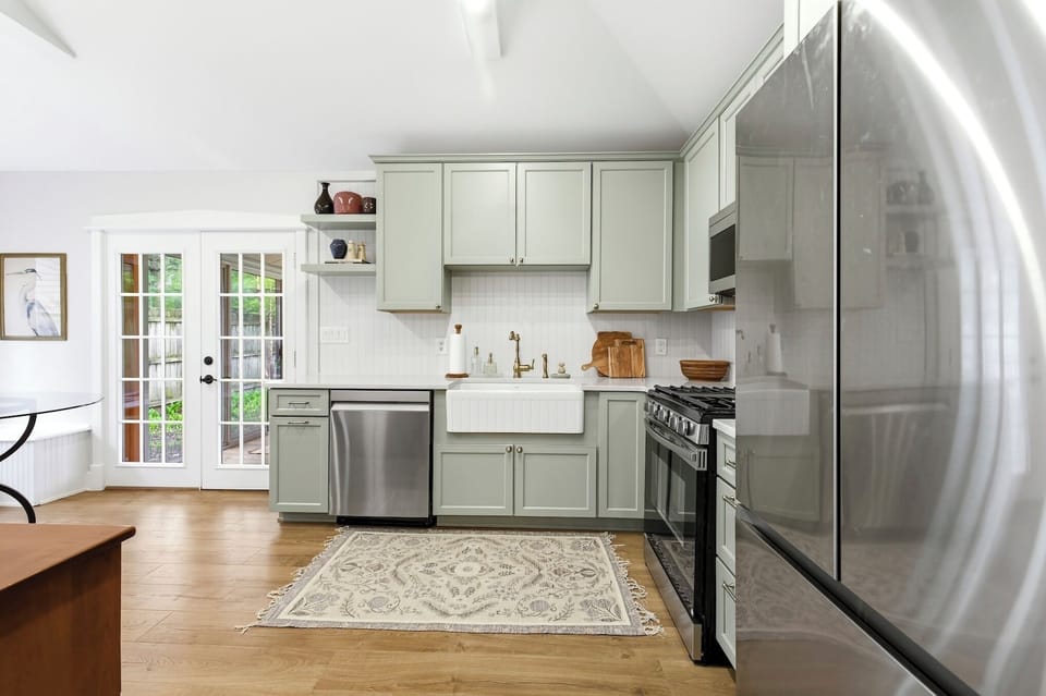 Open concept kitchen with stainless appliances