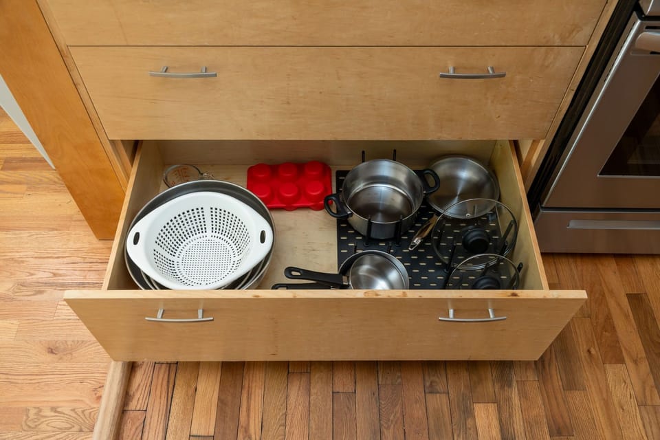 Your kitchen drawer is perfectly organized with quality cookware and utensils, making meal prep effortless during your stay.