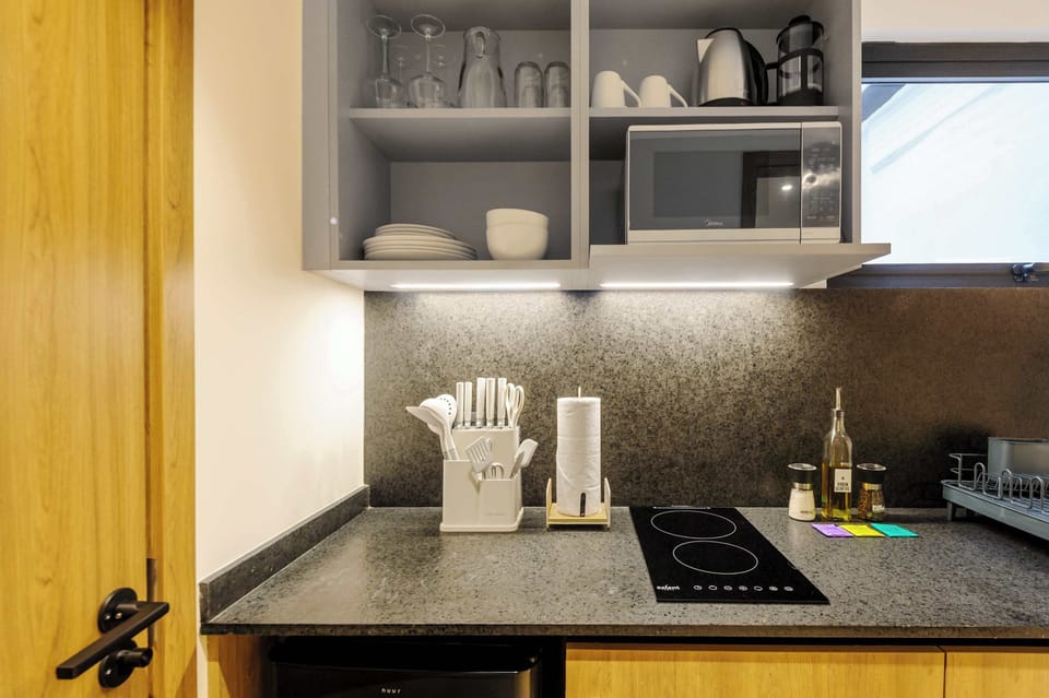 Fully equipped kitchenette for easy meals.