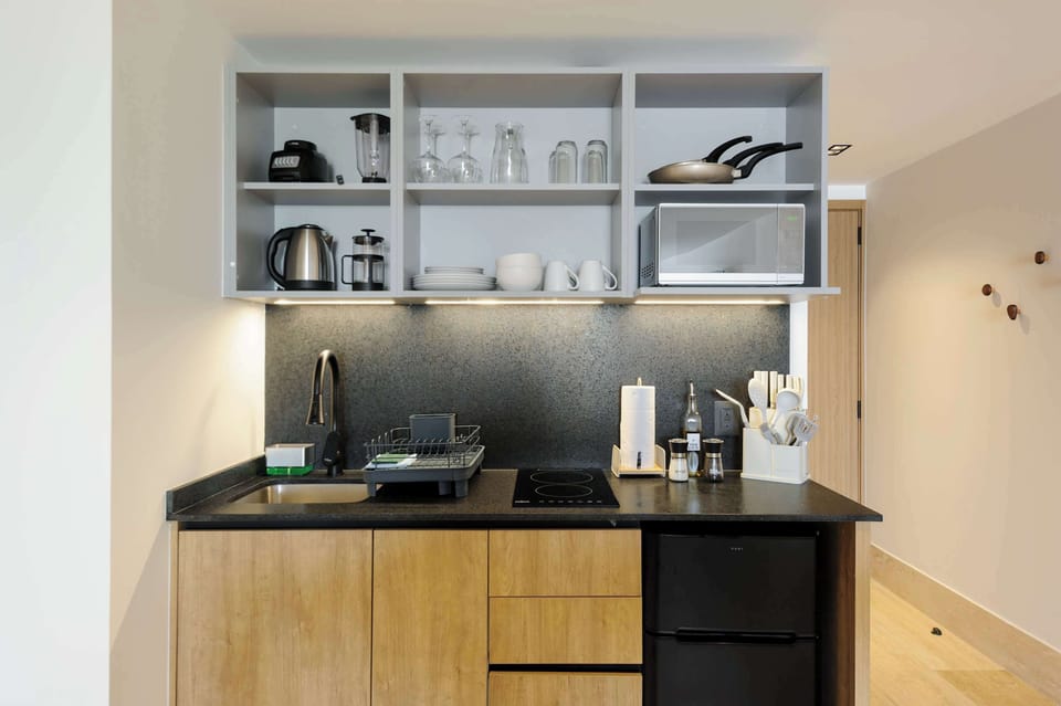 Fully equipped kitchen with sleek finishes.
