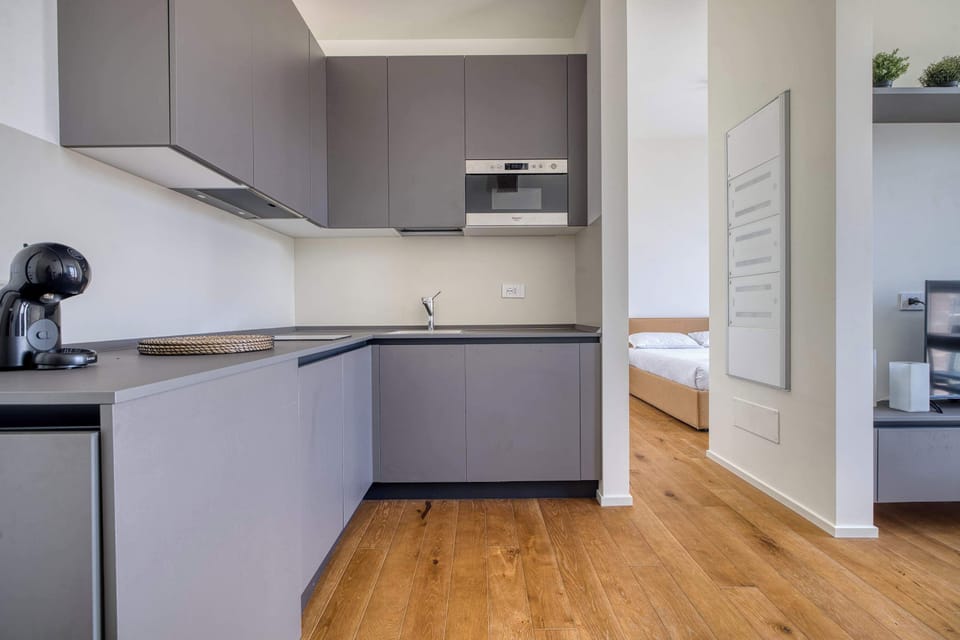 Modern kitchen with sleek finishes and functional layout.