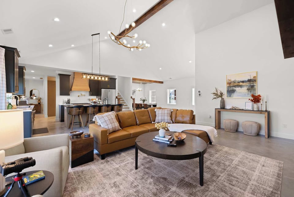 A bright open living area made for gathering relaxing and enjoying time together.