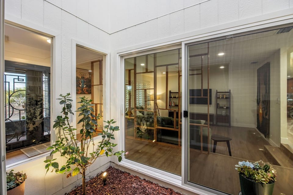 A private interior atrium — coffee in pajamas, no neighbors.