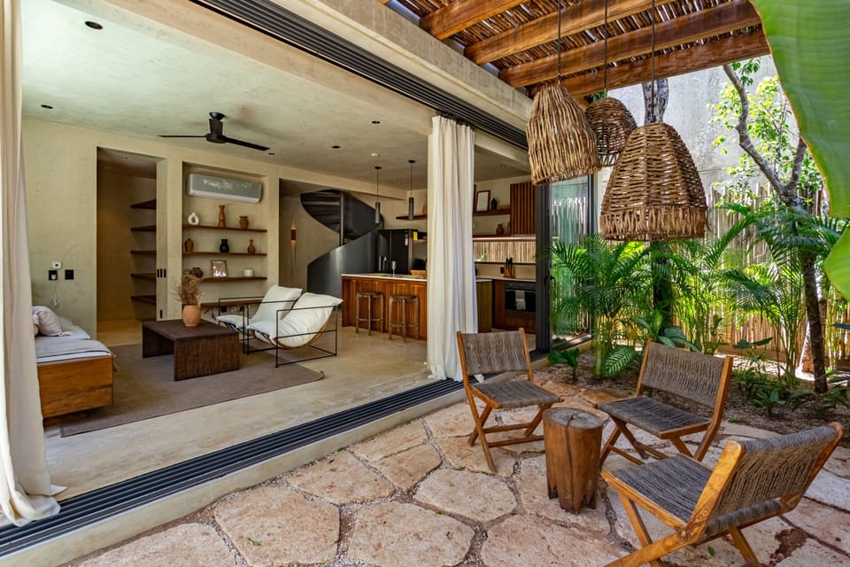 Interior and exterior spaces that merge into a single, continuous environment.
