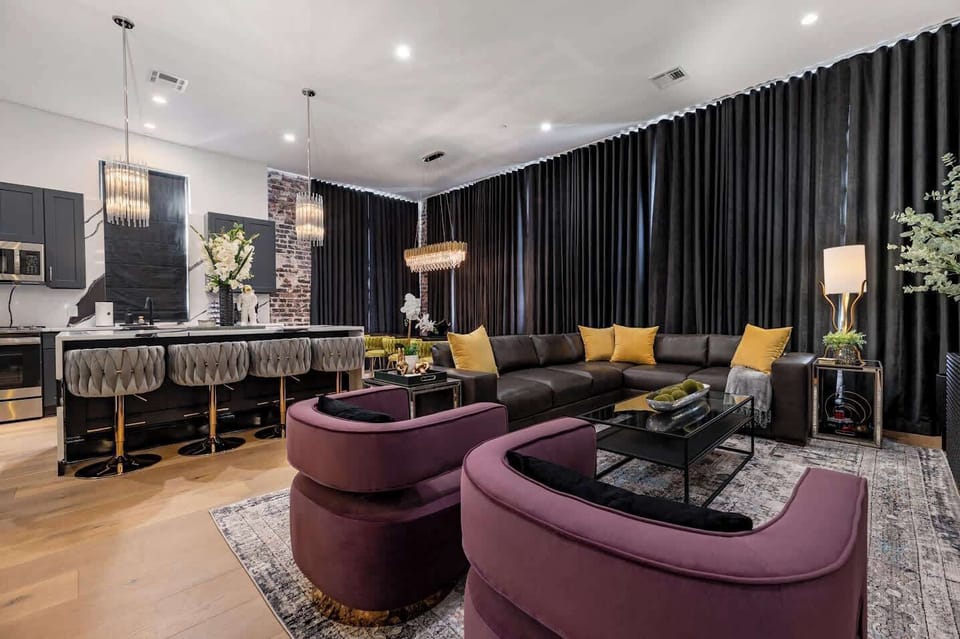 Living / Dining Area. Fully stocked kitchen with island and counter dining for four. Table dining for eight. Queen-size sleeper sofa.