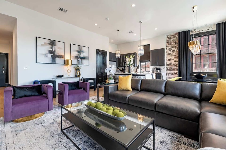Living / Dining Area. Fully stocked kitchen with island and counter dining for four. Table dining for eight. Queen-size sleeper sofa.