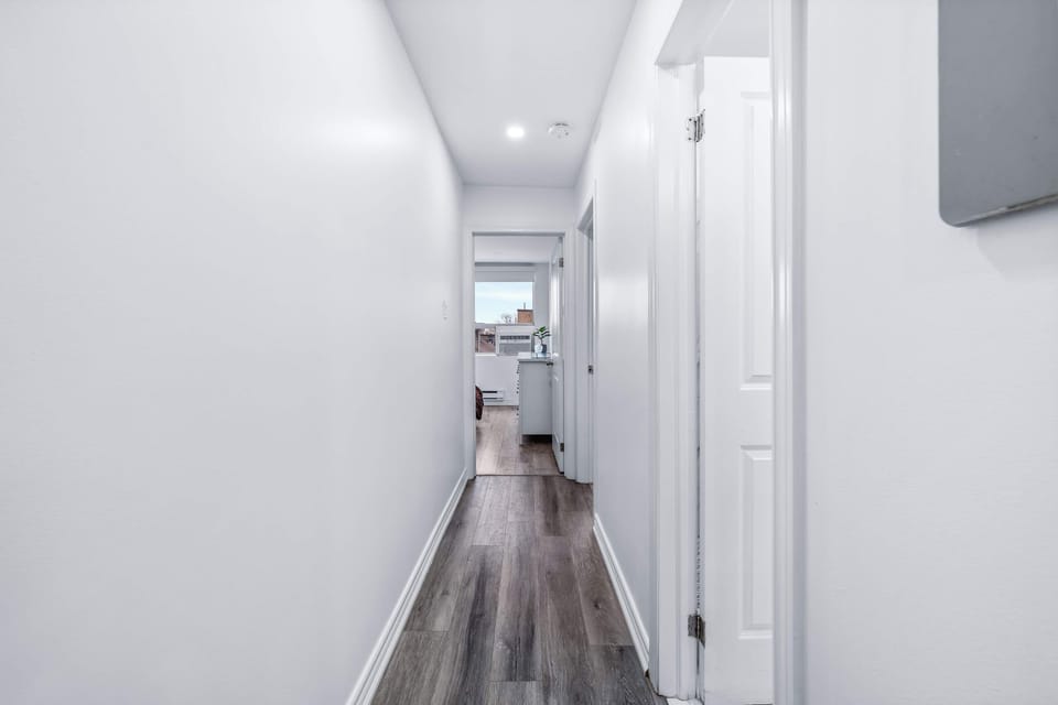 Bright hallway leading to bedrooms.