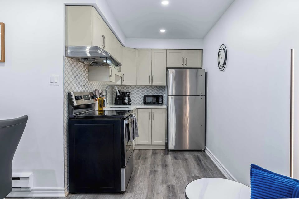 Kitchen with essential appliances.