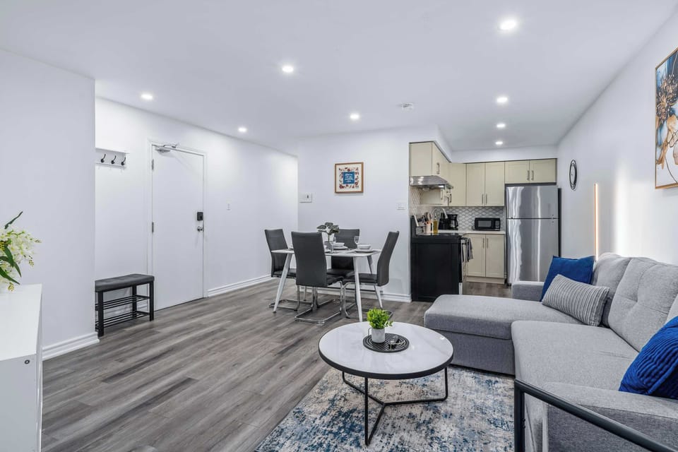 Open-concept space connecting living, dining and kitchen.