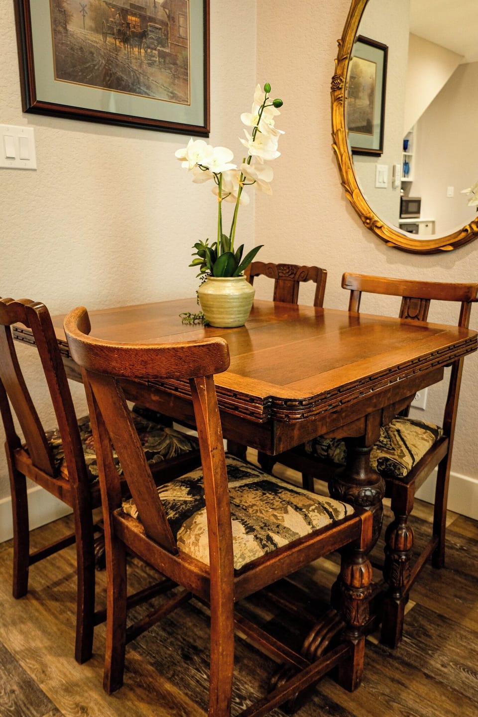Charming wood dining nook with elegant decor and seating for four