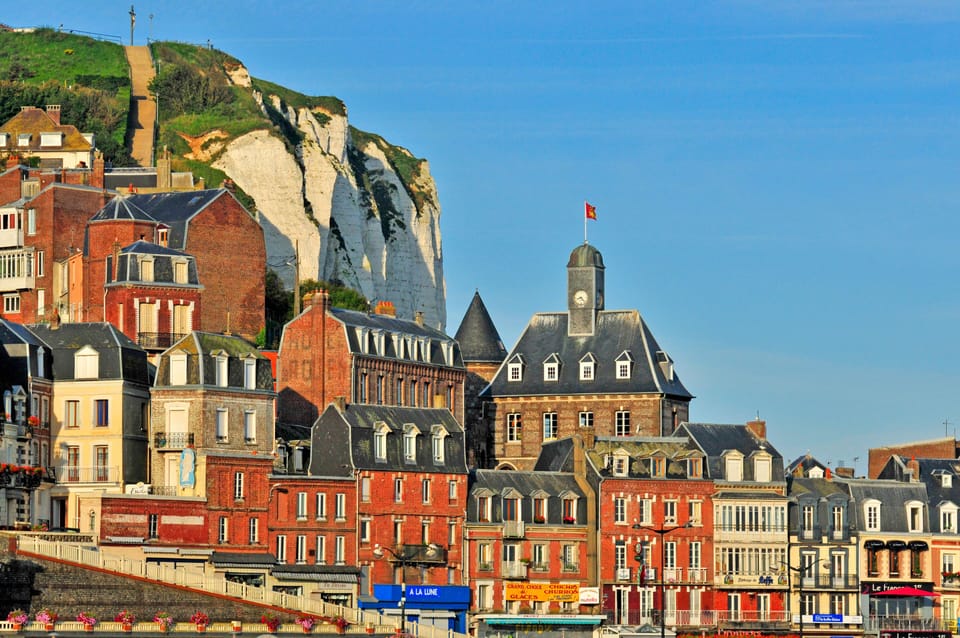 Fishing boats fill Le Tréport's harbour — fresh seafood restaurants line the quay nearby