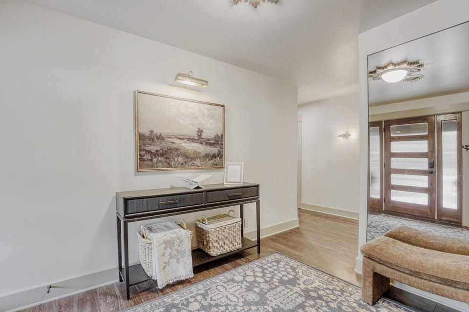 Welcoming entryway with clean lines and warm finishes, setting the tone for the rest of the home