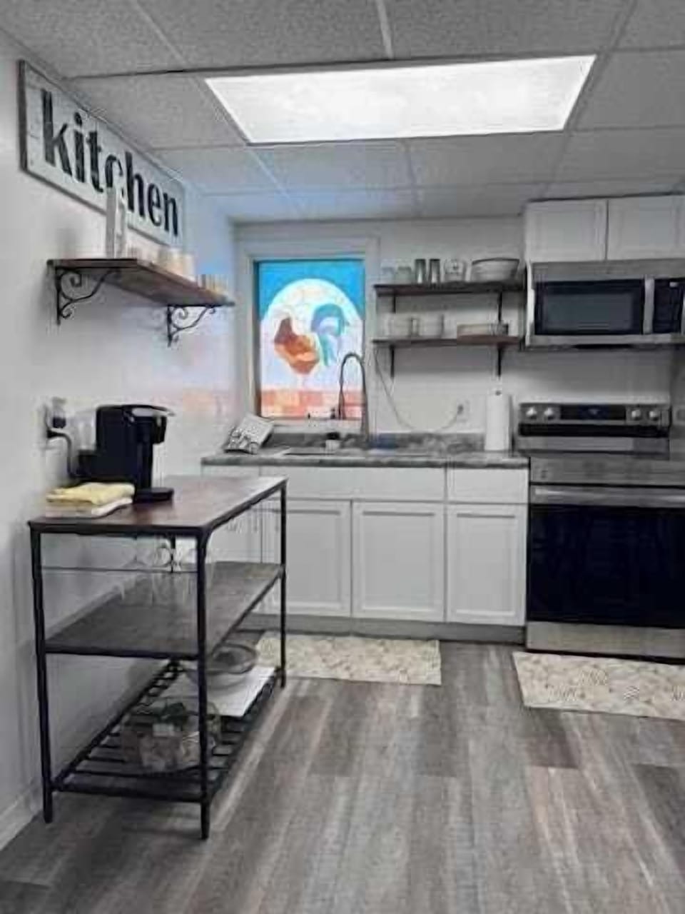 Kitchen, oven, toaster, microwave, refrigerator, coffee, tea, cooking pans, cooking utensils