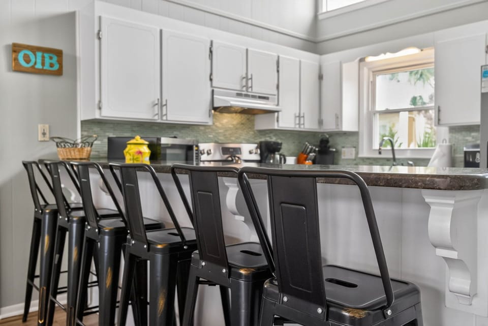 Kitchen island with bar seating for five