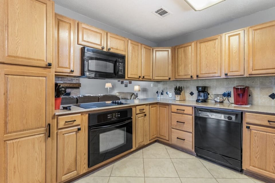 Kitchen | Black Appliances | Coffee Station & Tile Backsplash