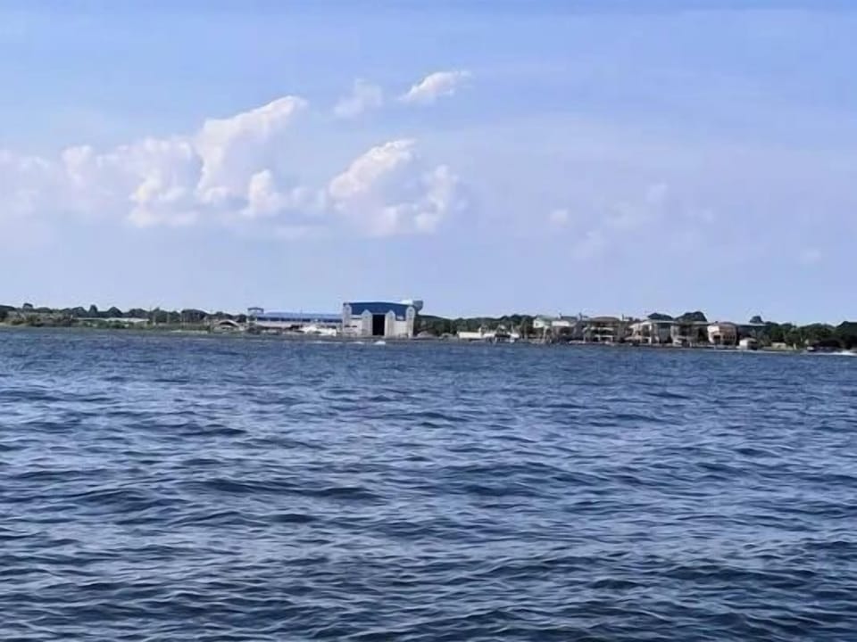 Peaceful waterfront views with open skies and a relaxing coastal backdrop
