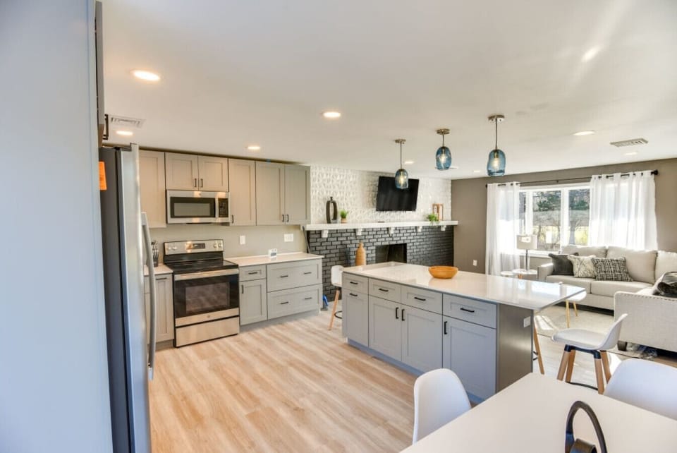 Kitchen | Island Countertop | Open Layout Fireplace & Seating Area