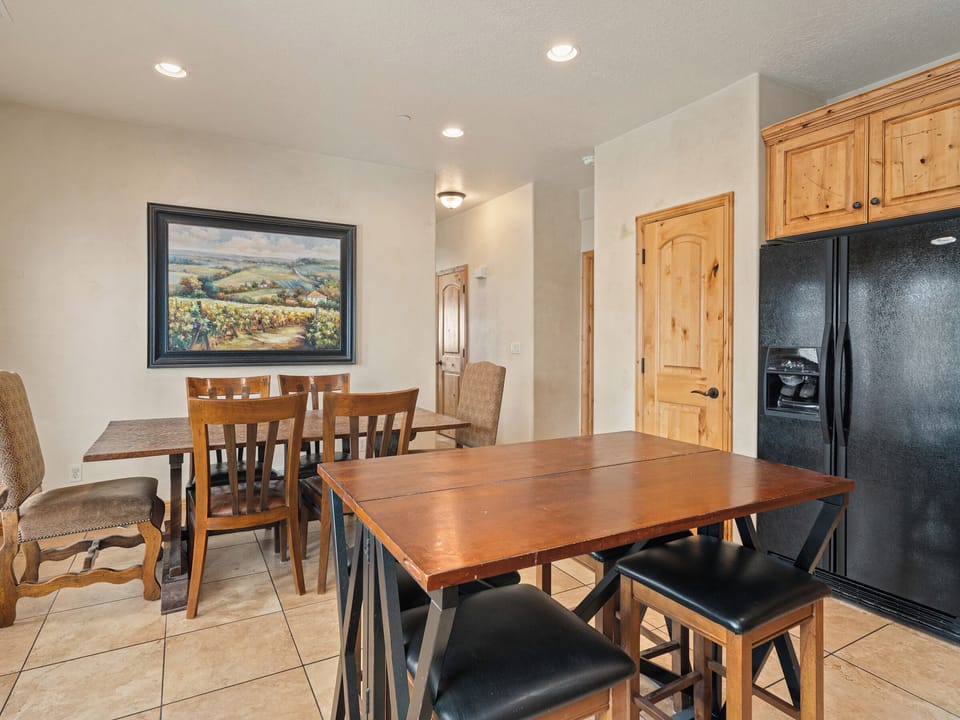 A charming dining area with rich finishes and natural light, offering the perfect setting for intimate dinners or lively conversations.