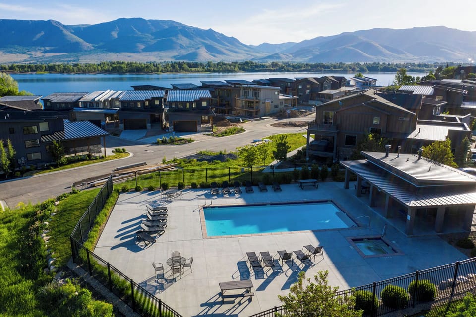Community pool with panoramic mountain and views close to Pineview Reservoir.