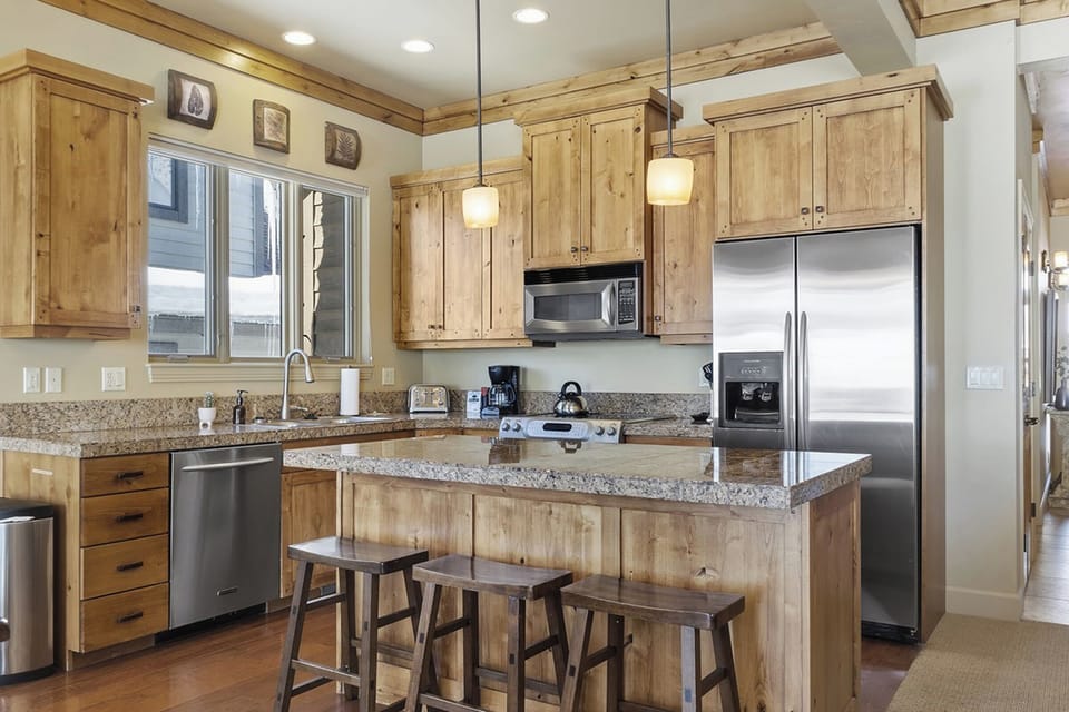 Gather around the island for coffee, conversation, or casual dining before heading out for the day.