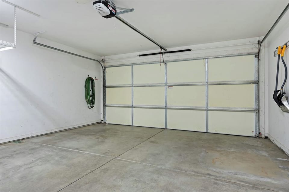 Spacious two-car garage with plenty of gear storage and a 6-pair boot dryer.