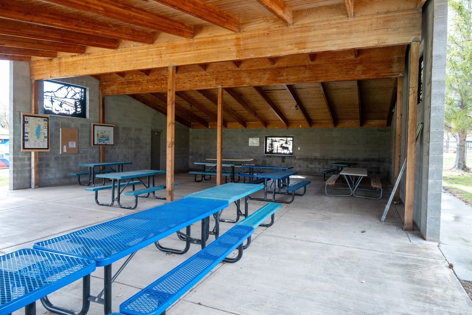 Covered picnic pavilion ideal for group gatherings, meals, and shaded relaxation.
