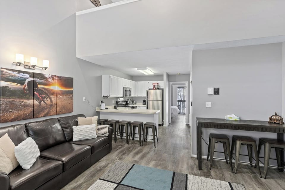 Spacious living area flowing into dining and kitchen—perfect for entertaining and family time.