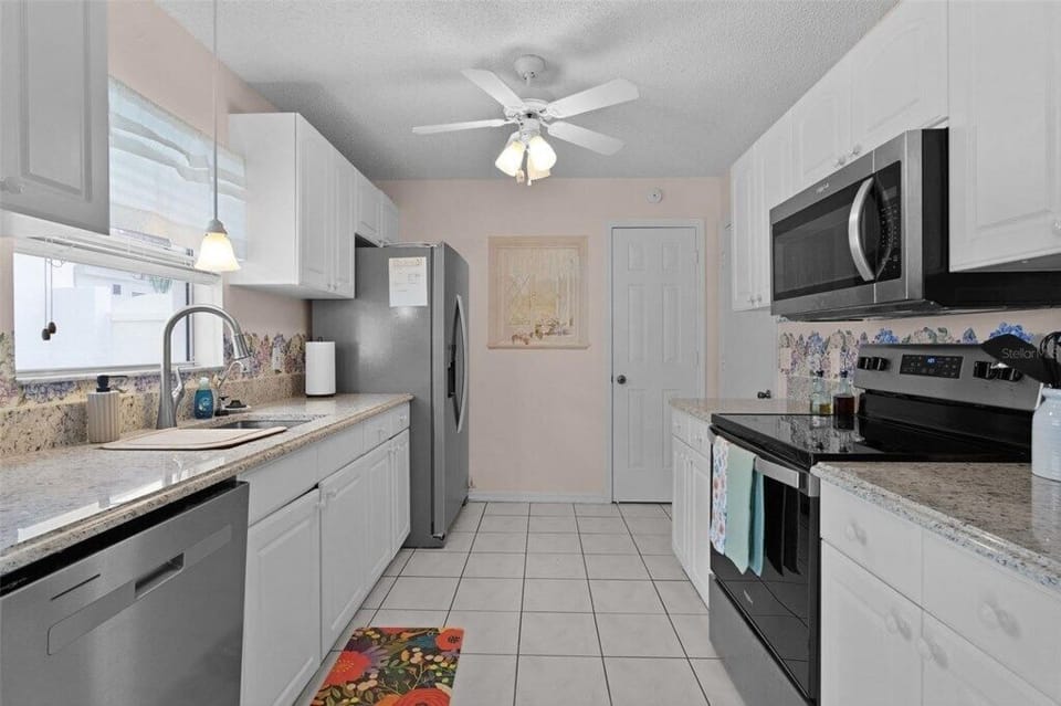 Kitchen and door to garage.