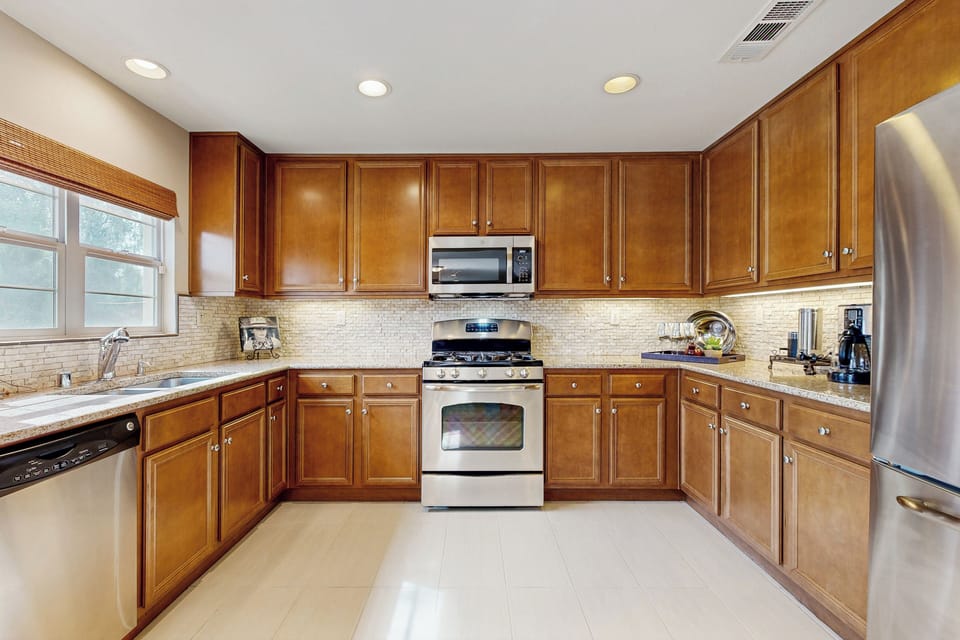 Stainless steel appliances and cooking essentials.