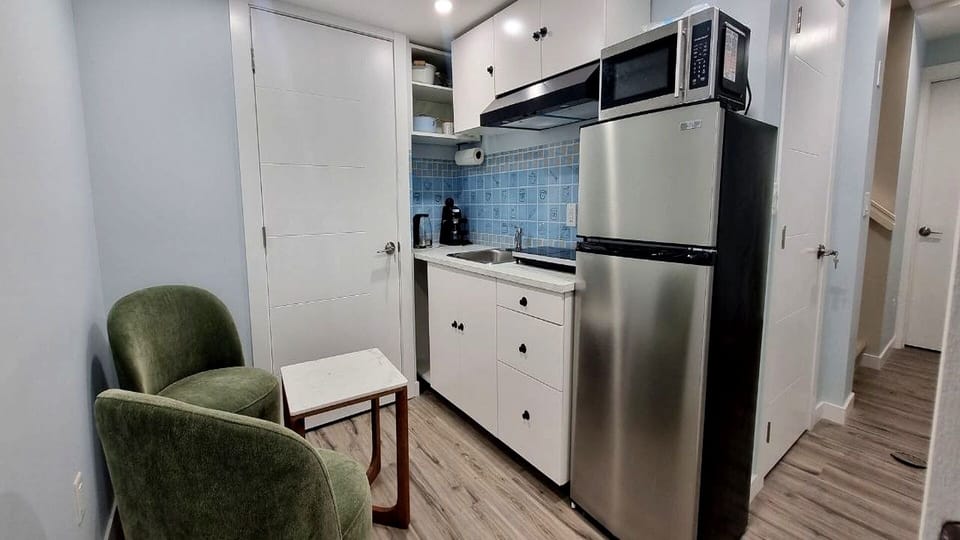 microwave, indoor, coffee maker, kitchen, refrigerator, kitchennett